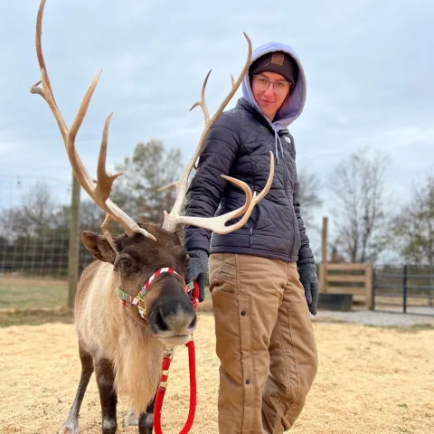 a person holding a dog