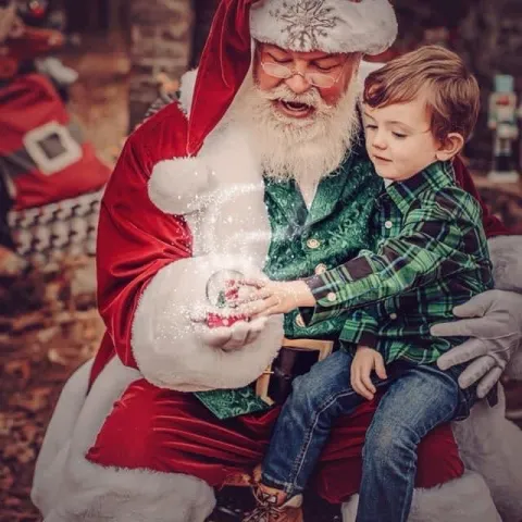 a person holding a baby