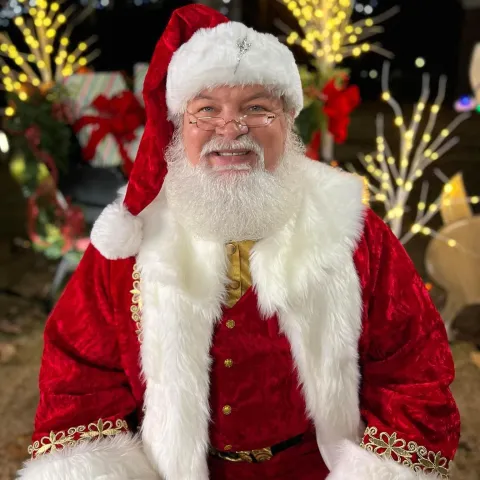 a person wearing a christmas hat