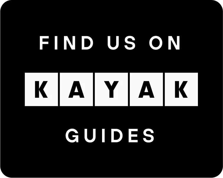 Sign reads 'Find us on KAYAK Guides' with black background.